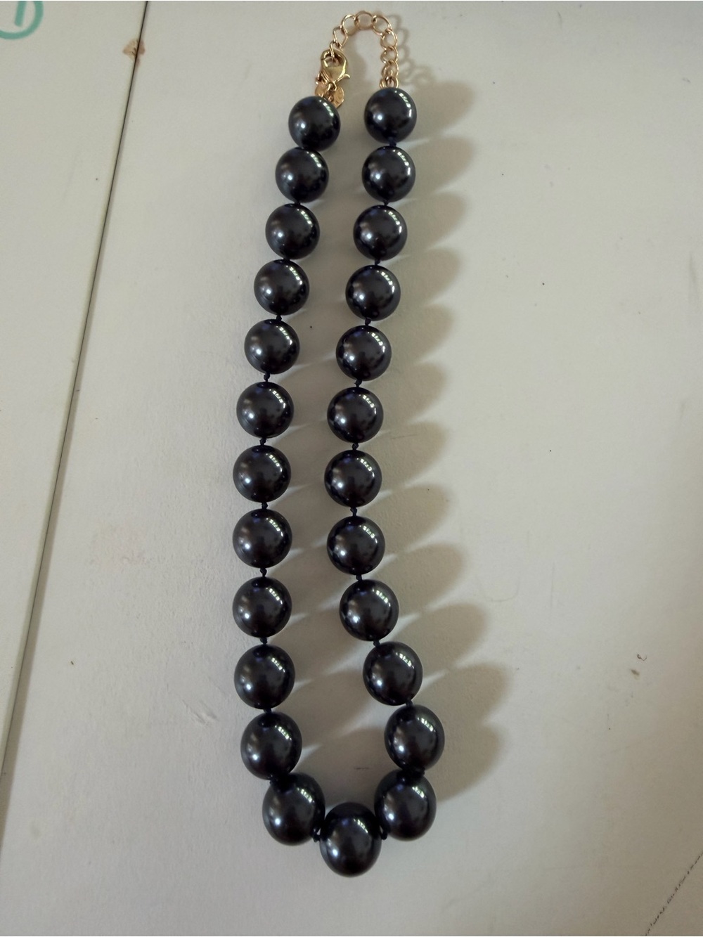 Elegant Black Pearl Necklace with Gold Chain Accent